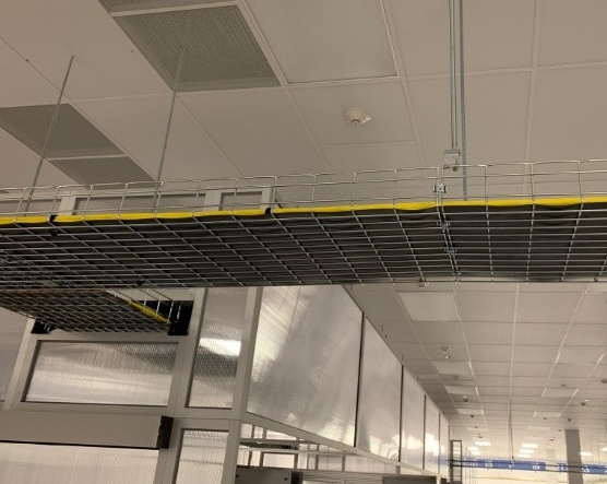 PlenaForm cable tray liner in overhead basket tray